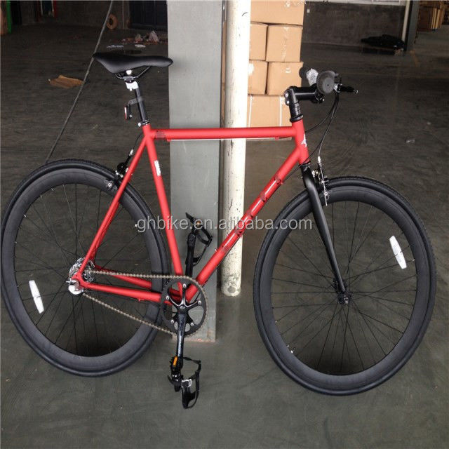 Bicicletta a 3 velocità a marcia fissa di colore rosso con pneumatico Kenda e Neco Head Set su telaio in cromoli